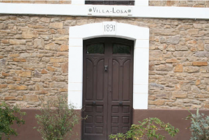 Inscripción en el dintel Villa de la Losa - Cuna 